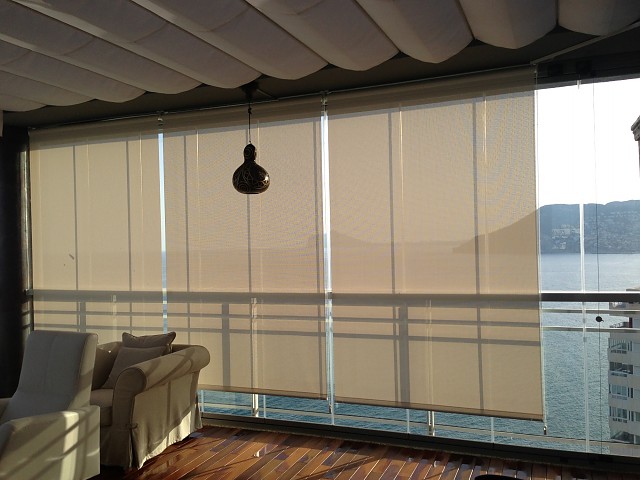Roller blinds for terrace glazing